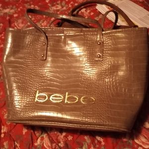 Bebe handbag with smaller makeup bag